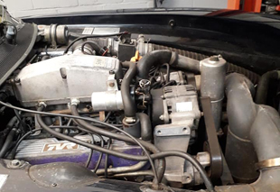 under the bonnet of a car service at Complete Autocare Wellingborough
