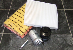 alternator, spark plugs and fan belt